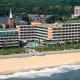 Virginia Beach hotel - Holiday Inn and Suites oceanfront hotel - aerial view of full rear exterior with beach and ocean